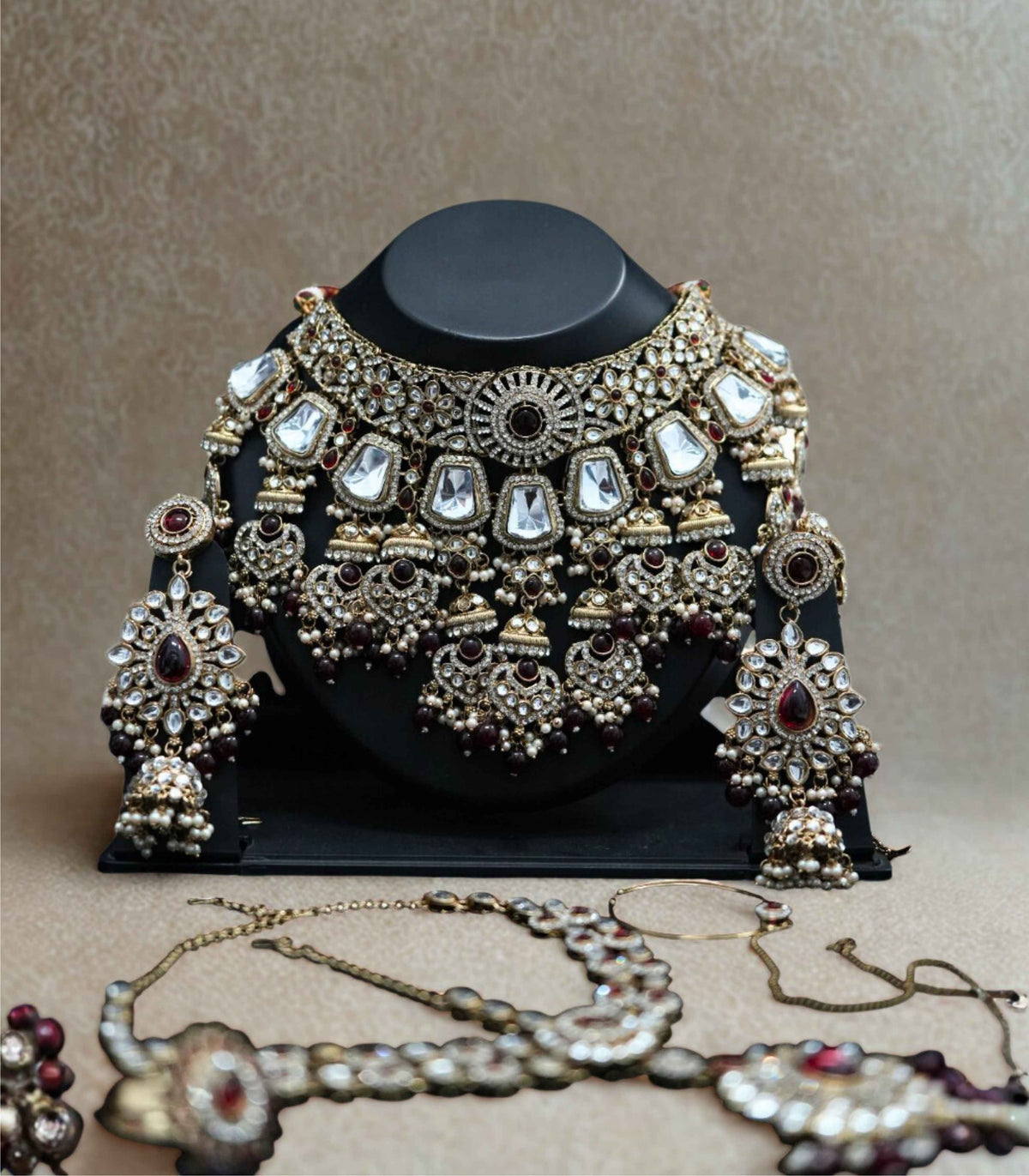 Heer ivory & ruby kundan set
